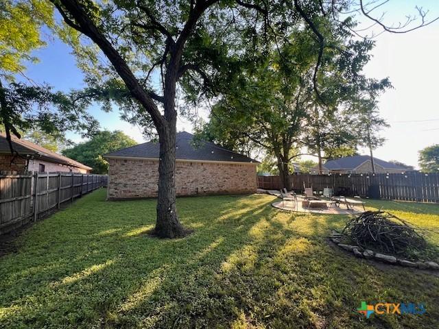 2800 S 3- A St, Waco, TX 76706 - view of yard featuring a patio area