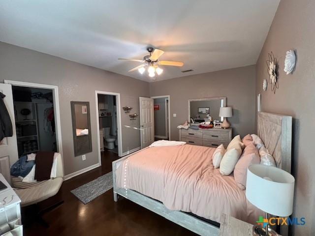 2800 S 3- A St, Waco, TX 76706 - bedroom with wood finished floors, baseboards, a ceiling fan, and ensuite bathroom