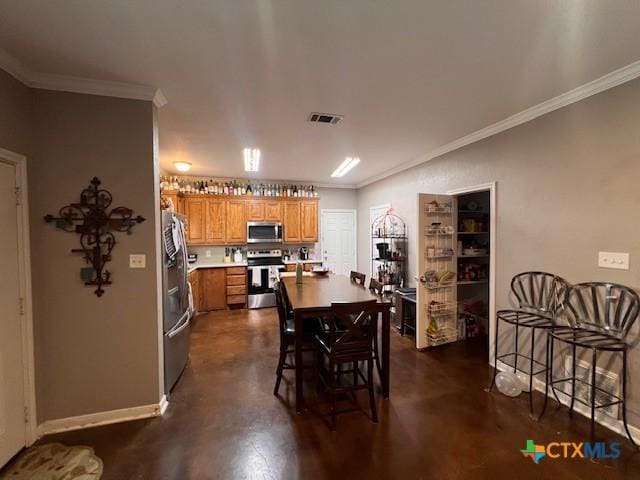 2800 S 3- A St, Waco, TX 76706 - dining area featuring crown molding