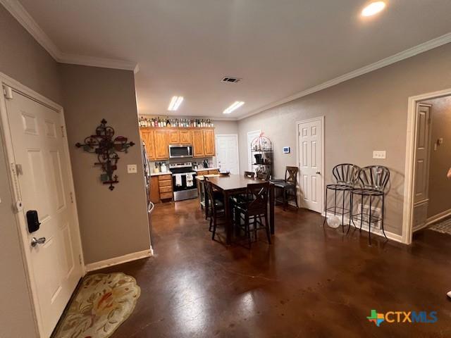 2800 S 3- A St, Waco, TX 76706 - dining area with crown molding and baseboards