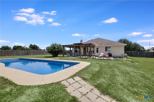 view of pool with a lawn, a patio area, and a pergola