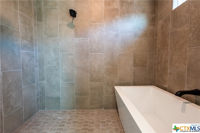 bathroom with independent shower and bath