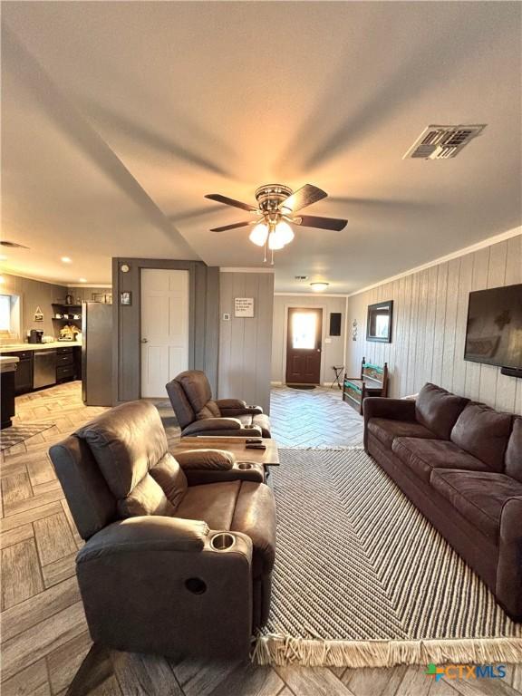 living room featuring ceiling fan