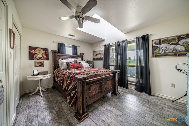 bedroom with ceiling fan and wood-type flooring