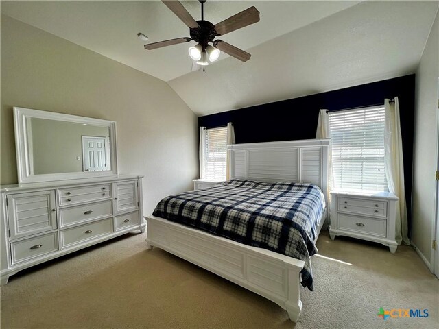 2005 Stonehenge Dr, Harker Heights, TX 76548 - bedroom featuring light colored carpet, multiple windows, lofted ceiling, and a ceiling fan