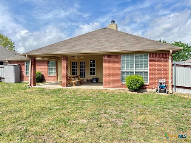 2005 Stonehenge Dr, Harker Heights, TX 76548 - back of house with a patio, brick siding, a chimney, ceiling fan, and a shingled roof