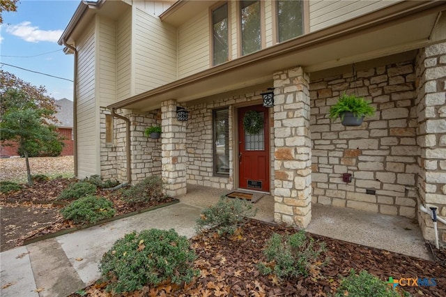 entrance to property with covered porch