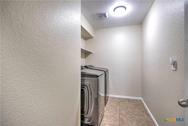 home office featuring ceiling fan, carpet floors, and a textured ceiling