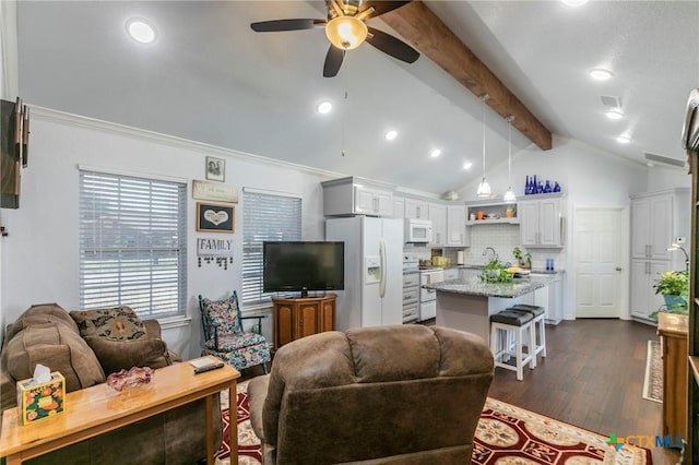 living room with sink, ceiling fan, lofted ceiling with beams, dark wood-type flooring, and crown molding