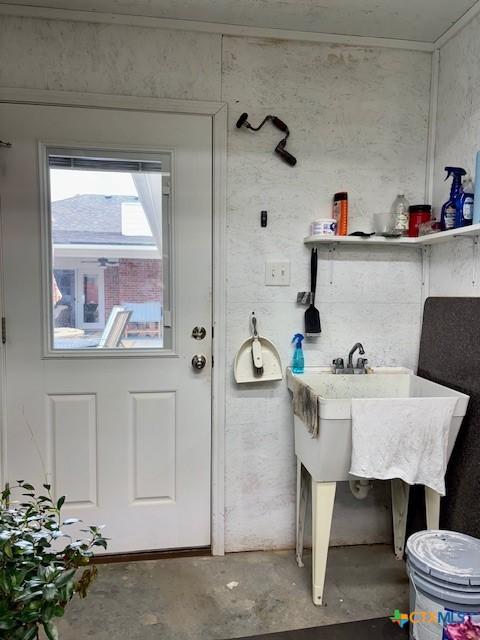 bathroom with concrete flooring