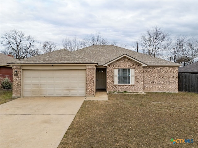 ranch-style home with a front lawn and a garage