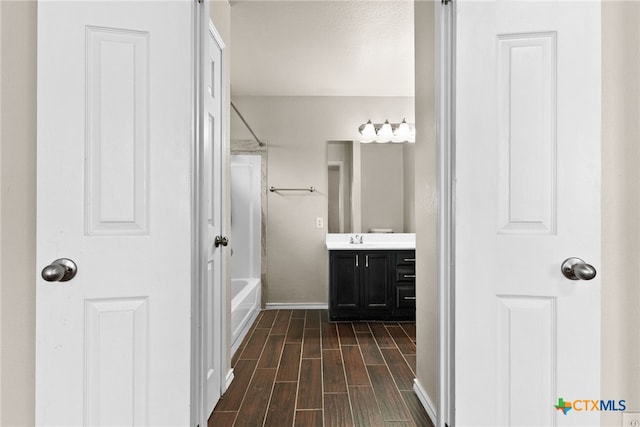 bathroom featuring vanity and shower / bathtub combination