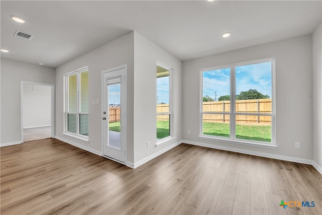 doorway with light hardwood / wood-style floors