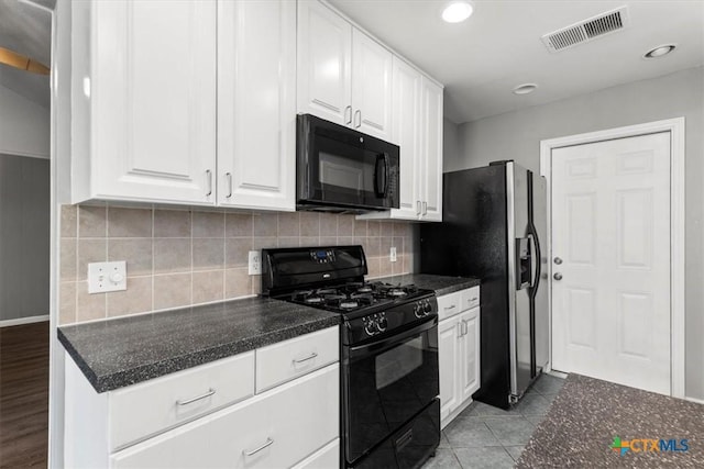 12103 Wycliff Ln, Austin, TX 78727 - kitchen with black appliances, white cabinets, decorative backsplash, recessed lighting, and light tile patterned floors