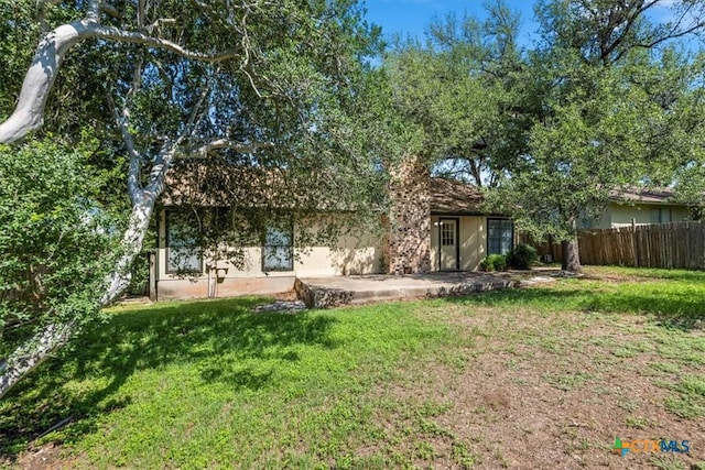 12103 Wycliff Ln, Austin, TX 78727 - back of house featuring a patio area and stucco siding