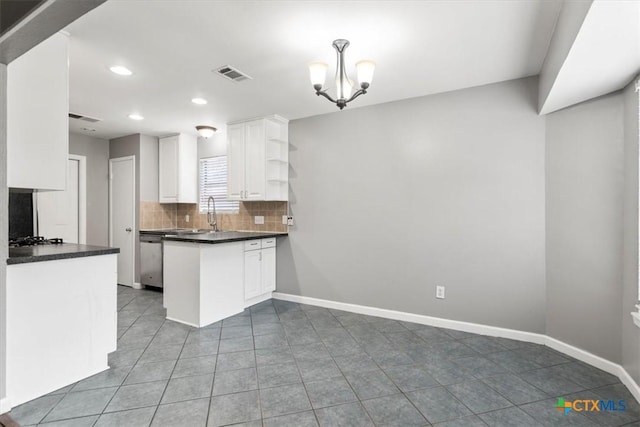 12103 Wycliff Ln, Austin, TX 78727 - kitchen featuring dark countertops, open shelves, white cabinetry, backsplash, and tile patterned floors