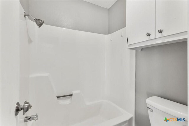 12103 Wycliff Ln, Austin, TX 78727 - bathroom featuring shower / bathtub combination and toilet