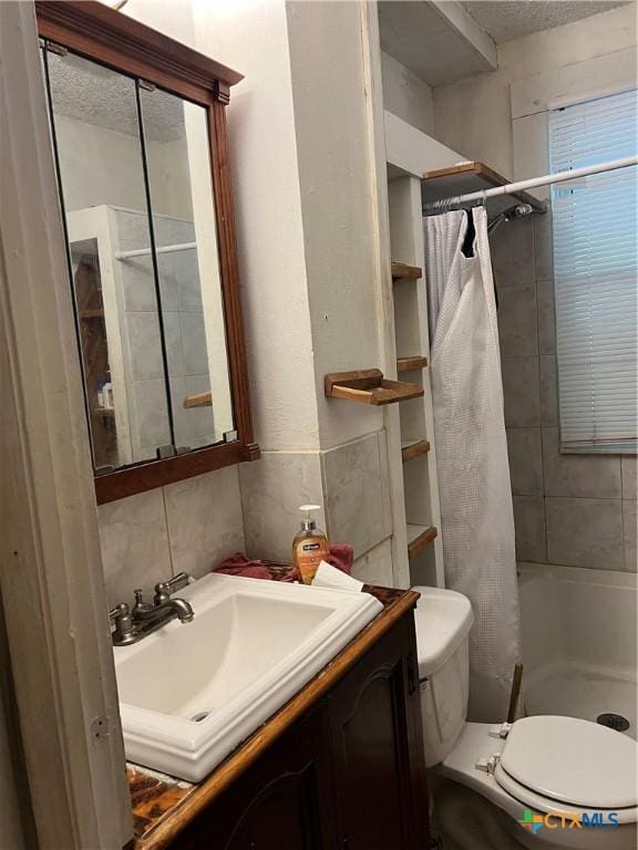 310 Smith Ln Unit A, San Marcos, TX 78666 - full bath with vanity, a shower with curtain, and toilet