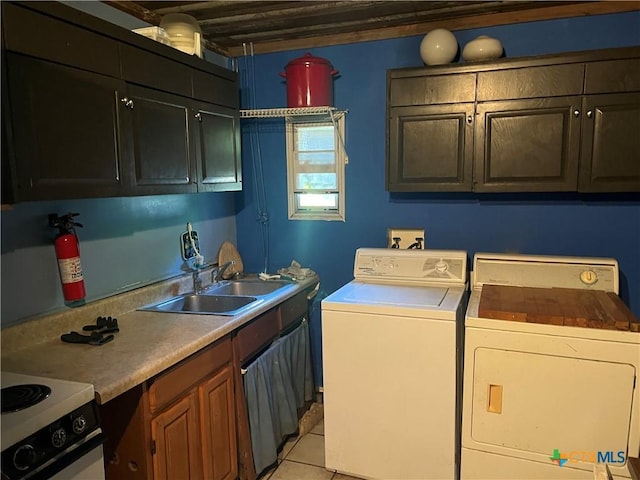 310 Smith Ln Unit A, San Marcos, TX 78666 - laundry area with separate washer and dryer and light tile patterned floors