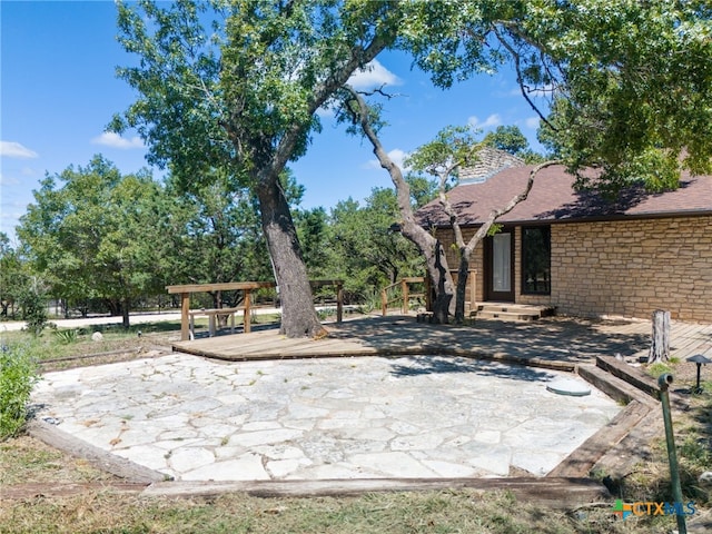 view of patio featuring a wooden deck