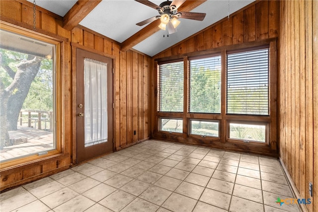 unfurnished sunroom with vaulted ceiling with beams, ceiling fan, and plenty of natural light