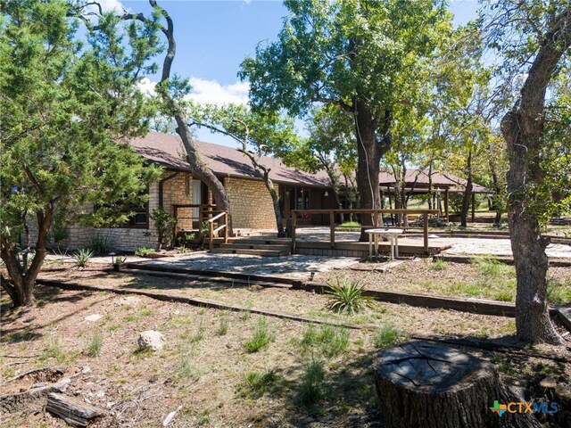 exterior space with a wooden deck