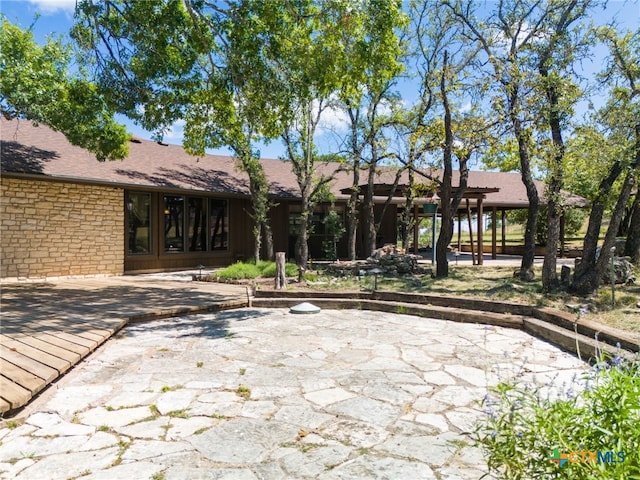 back of house featuring a patio area