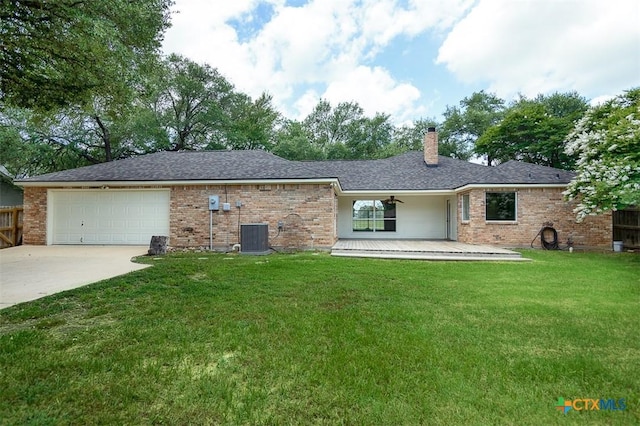 4113 Fm 1670, Belton, TX 76513 - view of front of property featuring a chimney, brick siding, concrete driveway, and an attached garage