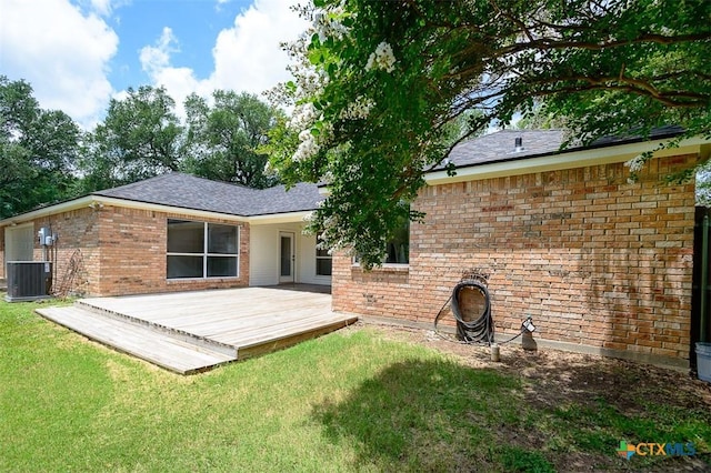 4113 Fm 1670, Belton, TX 76513 - back of house with brick siding, a wooden deck, and a yard