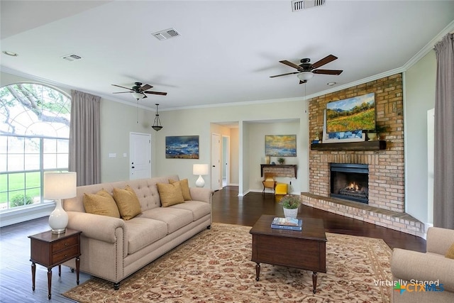4113 Fm 1670, Belton, TX 76513 - living room featuring a ceiling fan, healthy amount of natural light, wood finished floors, and crown molding