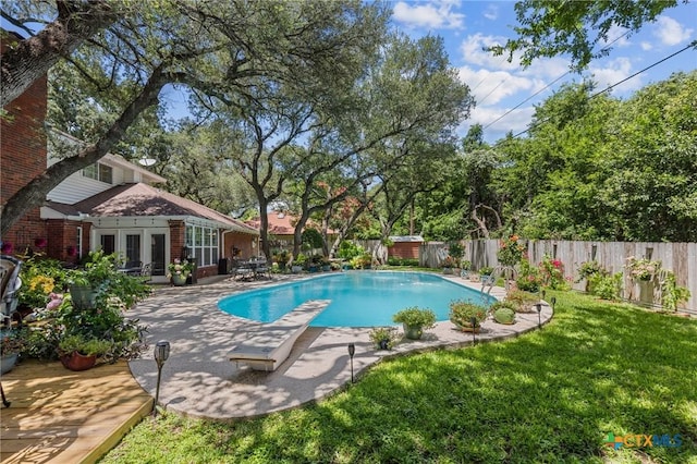 2203 Antelope Trl, Harker Heights, TX 76548 - view of swimming pool featuring french doors, a diving board, a fenced backyard, and a patio