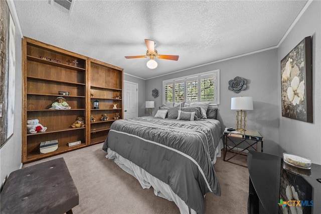 2203 Antelope Trl, Harker Heights, TX 76548 - carpeted bedroom featuring ornamental molding, a textured ceiling, and ceiling fan