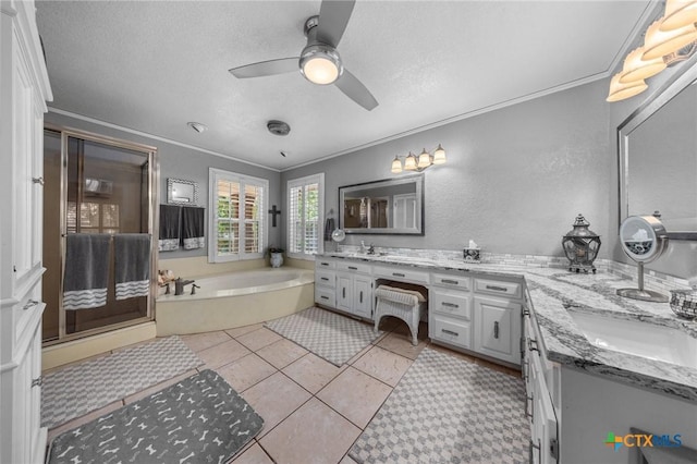 2203 Antelope Trl, Harker Heights, TX 76548 - full bathroom featuring double vanity, a garden tub, a ceiling fan, crown molding, and tile patterned flooring