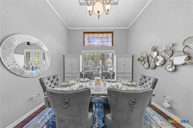 2203 Antelope Trl, Harker Heights, TX 76548 - dining room with a chandelier, crown molding, dark wood finished floors, and high vaulted ceiling