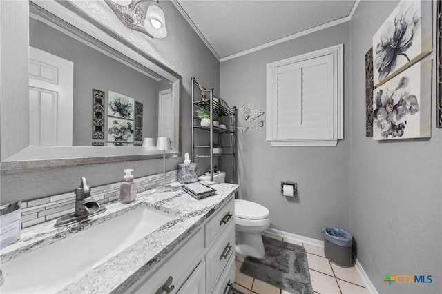 2203 Antelope Trl, Harker Heights, TX 76548 - bathroom with ornamental molding, vanity, and tile patterned floors