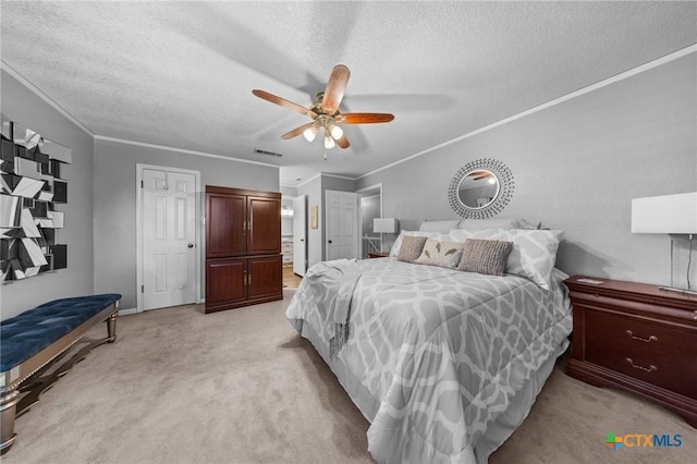 2203 Antelope Trl, Harker Heights, TX 76548 - bedroom with a textured ceiling, light carpet, ornamental molding, and a ceiling fan