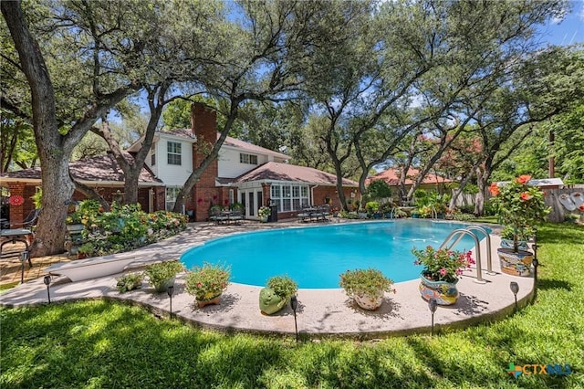 2203 Antelope Trl, Harker Heights, TX 76548 - outdoor pool with a patio area and a yard