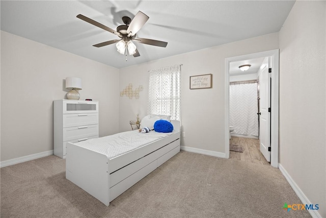 2416 Macdougal St, Nolanville, TX 76559 - bedroom featuring light carpet, baseboards, and ensuite bathroom