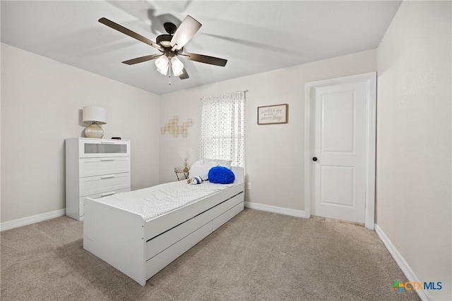 2416 Macdougal St, Nolanville, TX 76559 - bedroom with light colored carpet, baseboards, and a ceiling fan