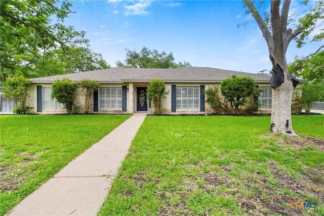 3202 Willow Rd, Temple, TX 76502 - ranch-style home featuring a front lawn and brick siding