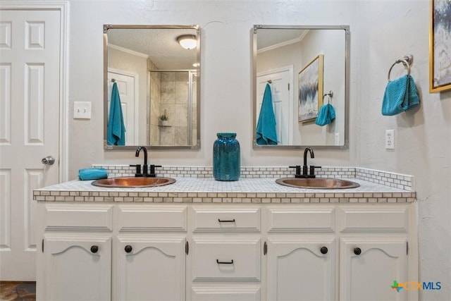 15 Willow Ct, Belton, TX 76513 - full bath featuring crown molding, double vanity, and a shower