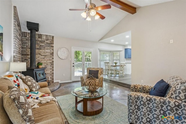 15 Willow Ct, Belton, TX 76513 - living room featuring a wood stove, beam ceiling, ceiling fan, recessed lighting, and baseboards