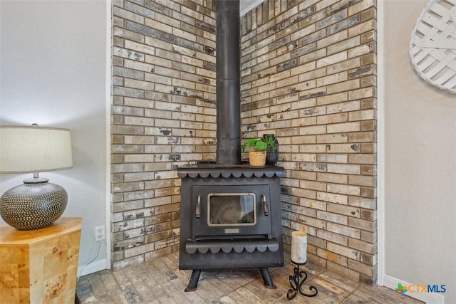15 Willow Ct, Belton, TX 76513 - detailed view of a wood stove and baseboards