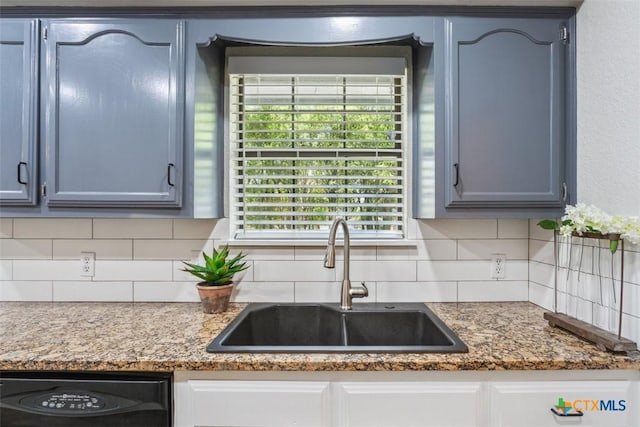15 Willow Ct, Belton, TX 76513 - kitchen with a sink, dishwasher, tasteful backsplash, and light stone countertops