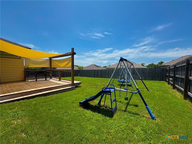 2321 Vicksburg Ln, Temple, TX 76504 - fenced backyard featuring a playground and a deck