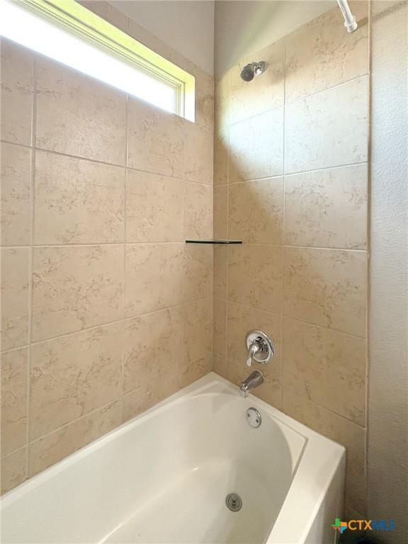 2321 Vicksburg Ln, Temple, TX 76504 - bathroom featuring shower / tub combination