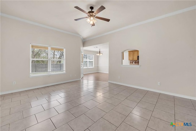 empty room featuring light tile patterned floors, baseboards, ornamental molding, and ceiling fan with notable chandelier