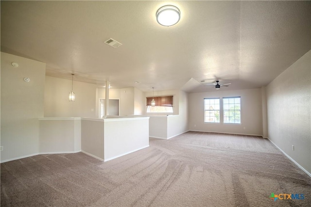5414 Birmingham Cir, Killeen, TX 76542 - unfurnished living room featuring ceiling fan, carpet, baseboards, and lofted ceiling
