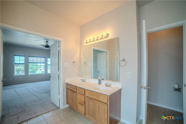 5414 Birmingham Cir, Killeen, TX 76542 - bathroom featuring tile patterned flooring, double vanity, a ceiling fan, and baseboards