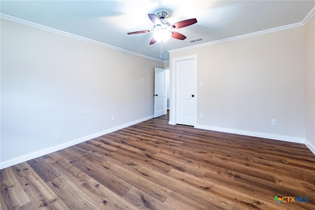 unfurnished room with ceiling fan, dark wood-type flooring, and ornamental molding